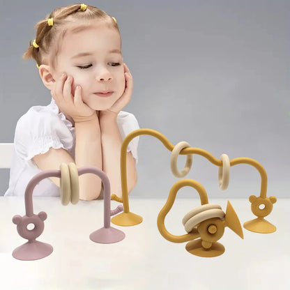 מסלול השחלת טבעות חושי עם כוסות יניקה